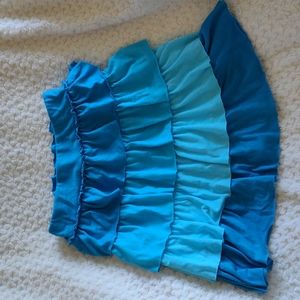 Multi color blue ruffle skirt size 14/16 with shorts under skirt